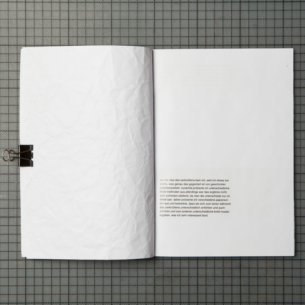 the interior pages shows consists of a crumpled spread on the left and the editorial on the right side