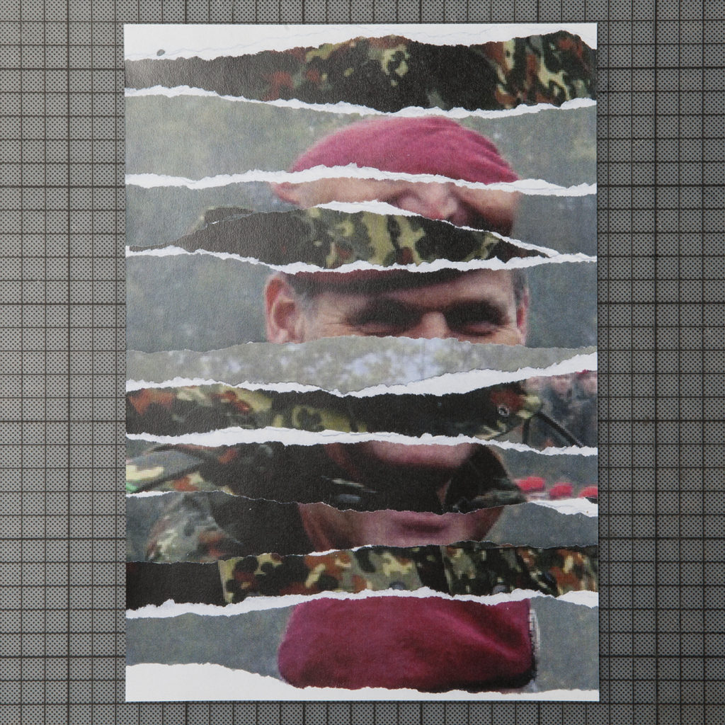 the poster shows a soldier torn into strips and reassembled
