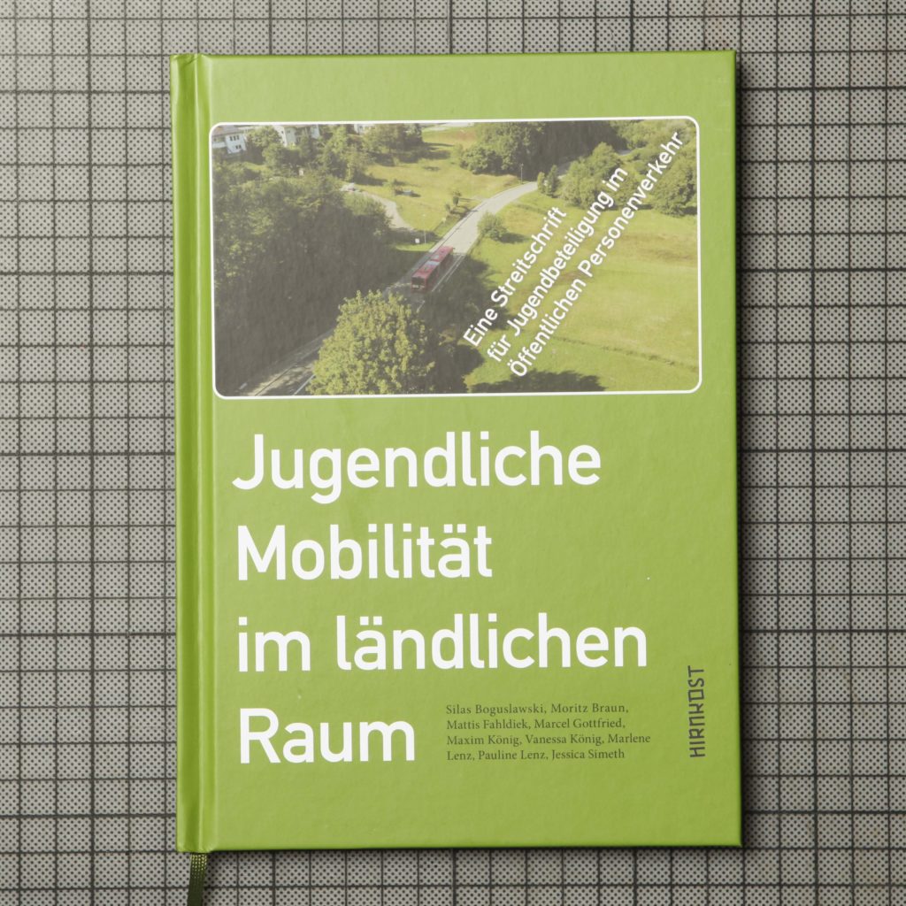 the book cover is designed with an image, the head- and subheadline, authors and logo on a green background